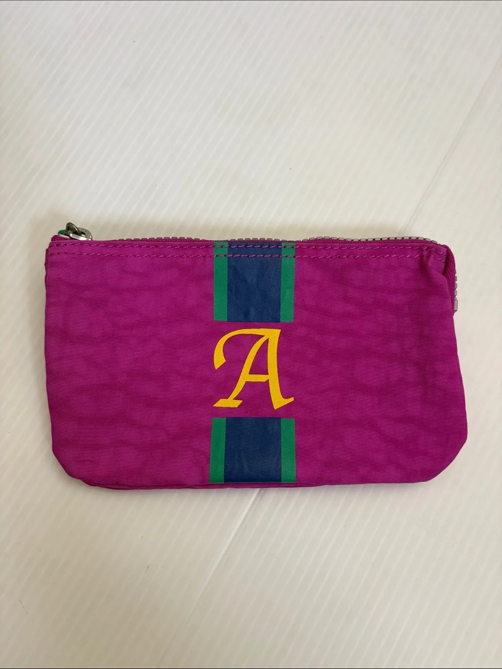 🌸 Kipling Monogram “A” cosmetic pouch